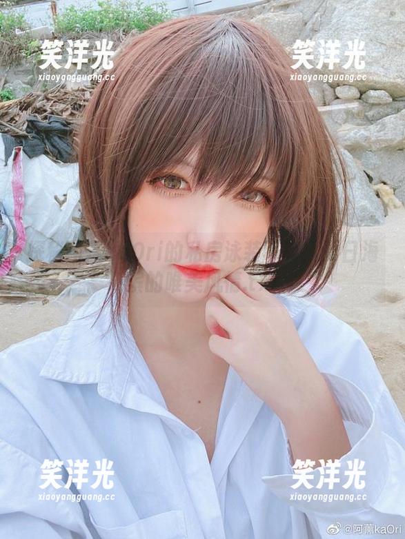 探秘阿薰kaOri的私房泳装写真：夏日海滨的唯美风情.txt